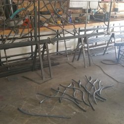 fitting and welding the branches into the actual railing frame 