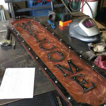 Copper and Hammered Iron Welcome sign