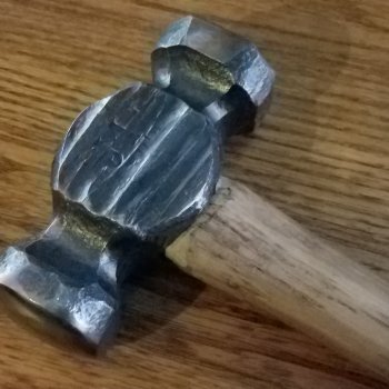 Rounding forge hammers